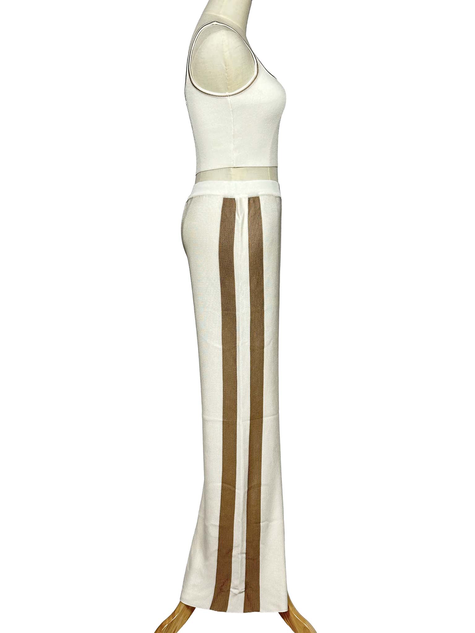 Mannequin wearing a Moeva white sleeveless top and pants set on a white background