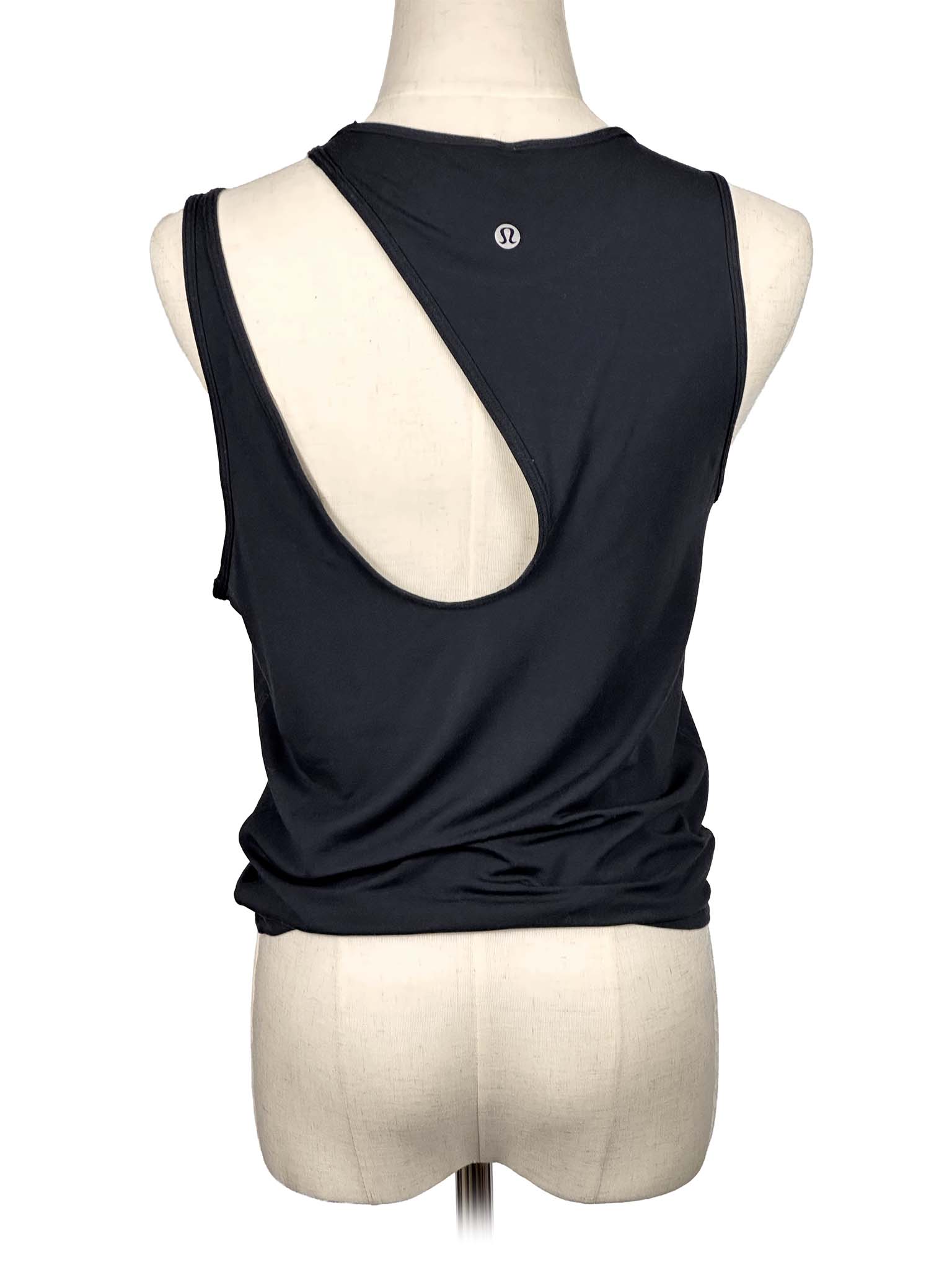Lululemon black sleeveless top on a mannequin with a white background