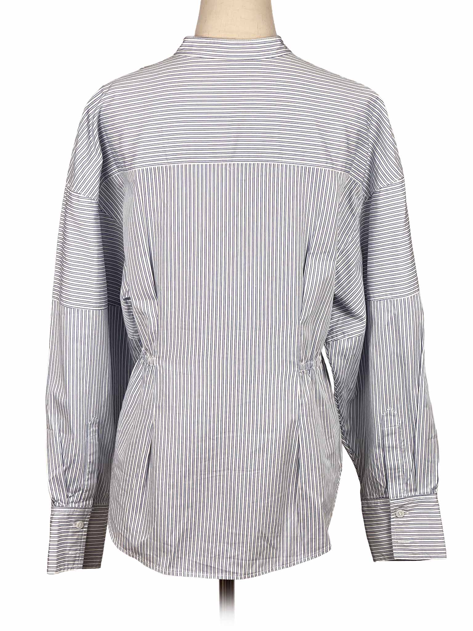 & Other Stories striped shirt on a mannequin against a white background