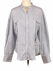 & Other Stories striped shirt on a mannequin against a white background