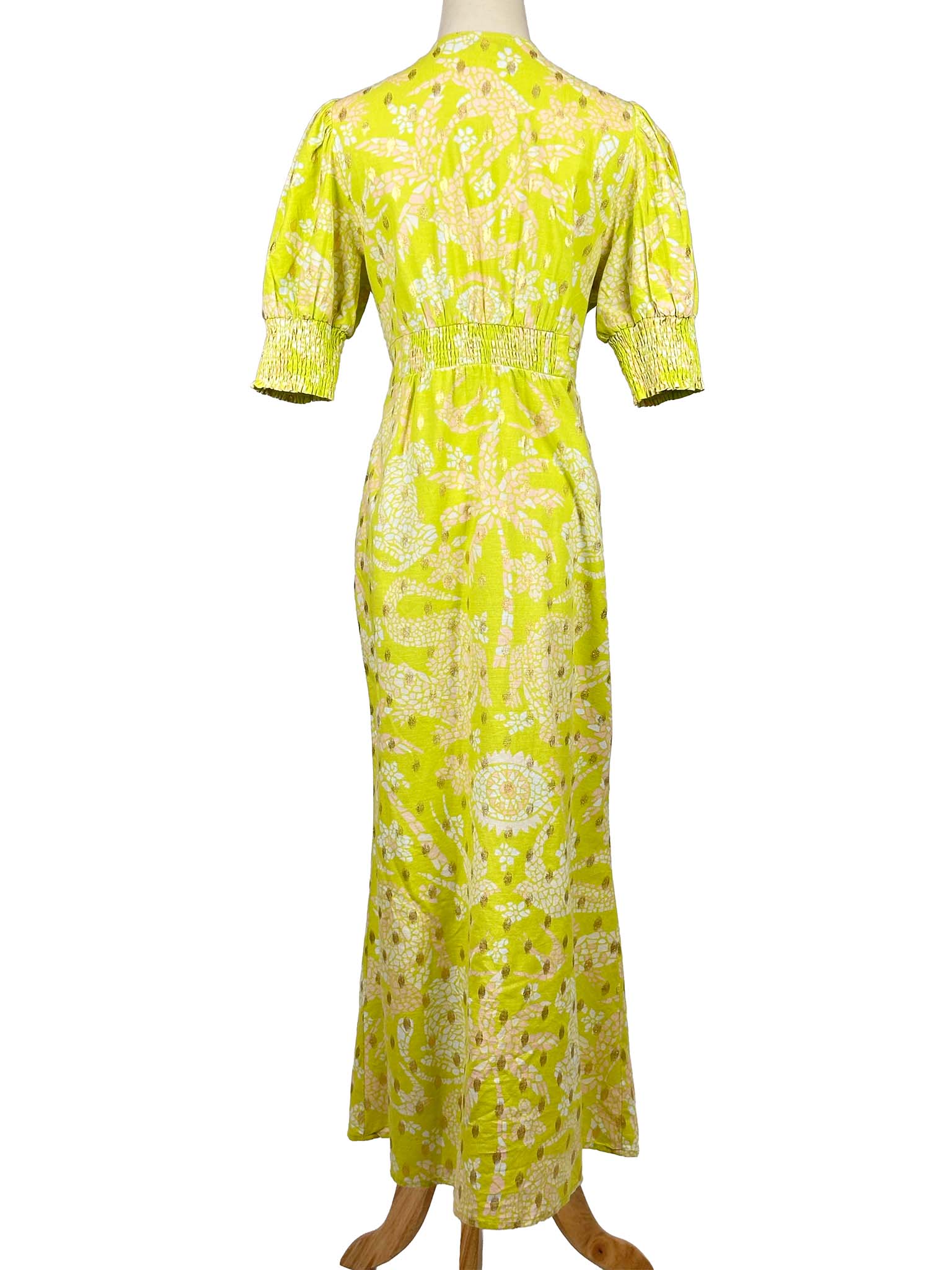 Never Fully Dressed lime floral dress on a mannequin against a white background