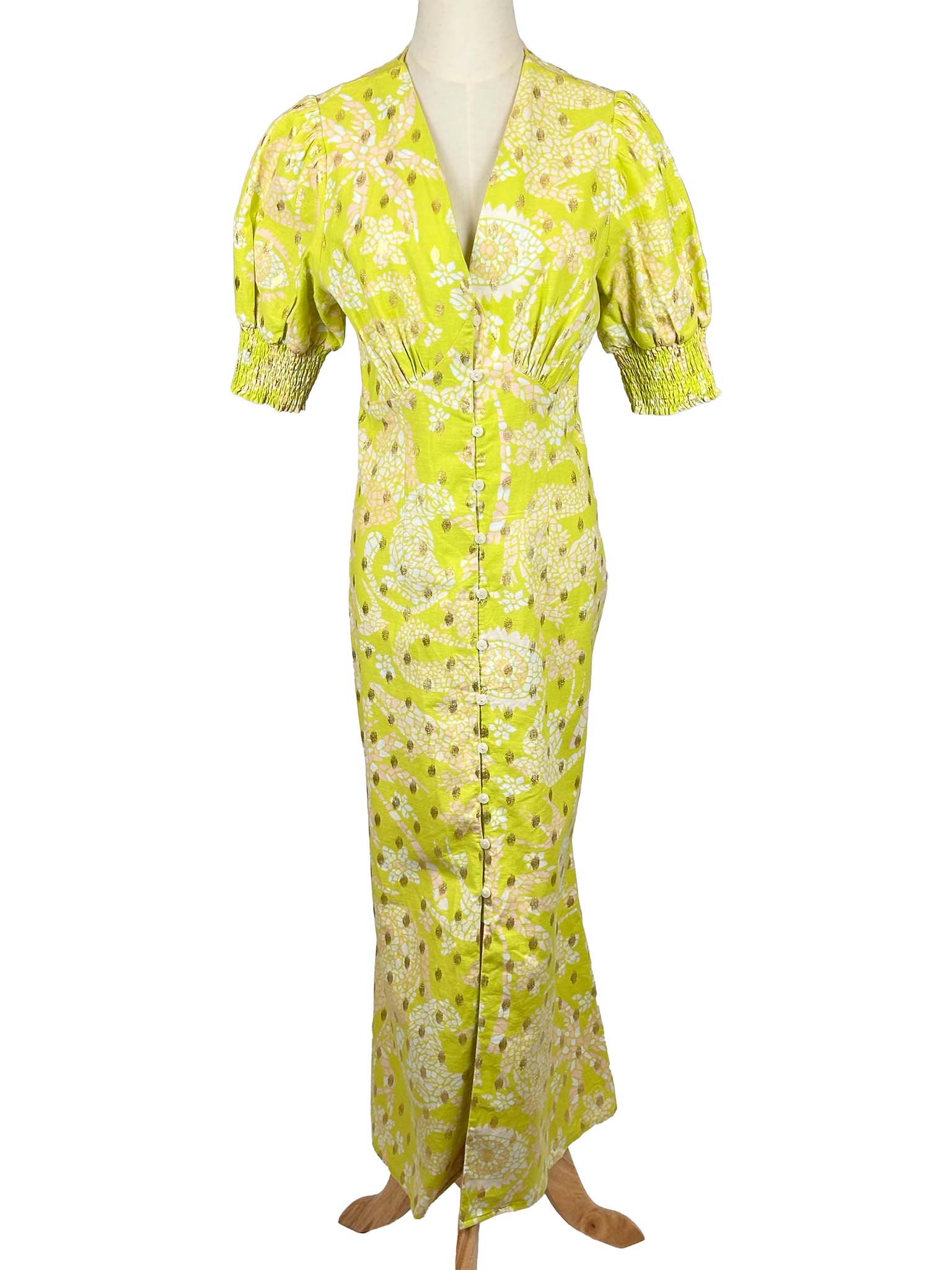 Never Fully Dressed lime floral dress on a mannequin against a white background