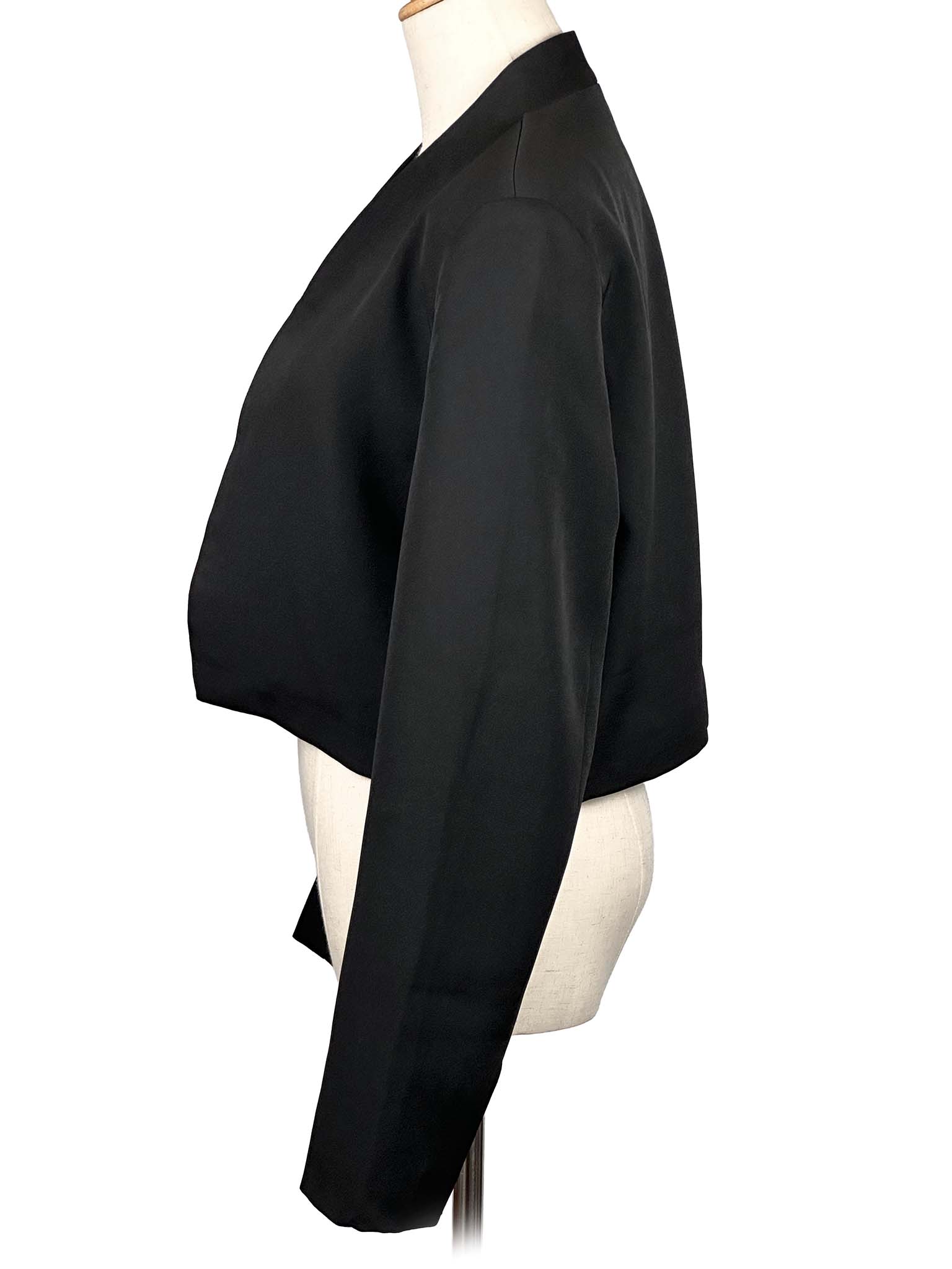 Smart And Joy black cropped blazer on a mannequin against a white background