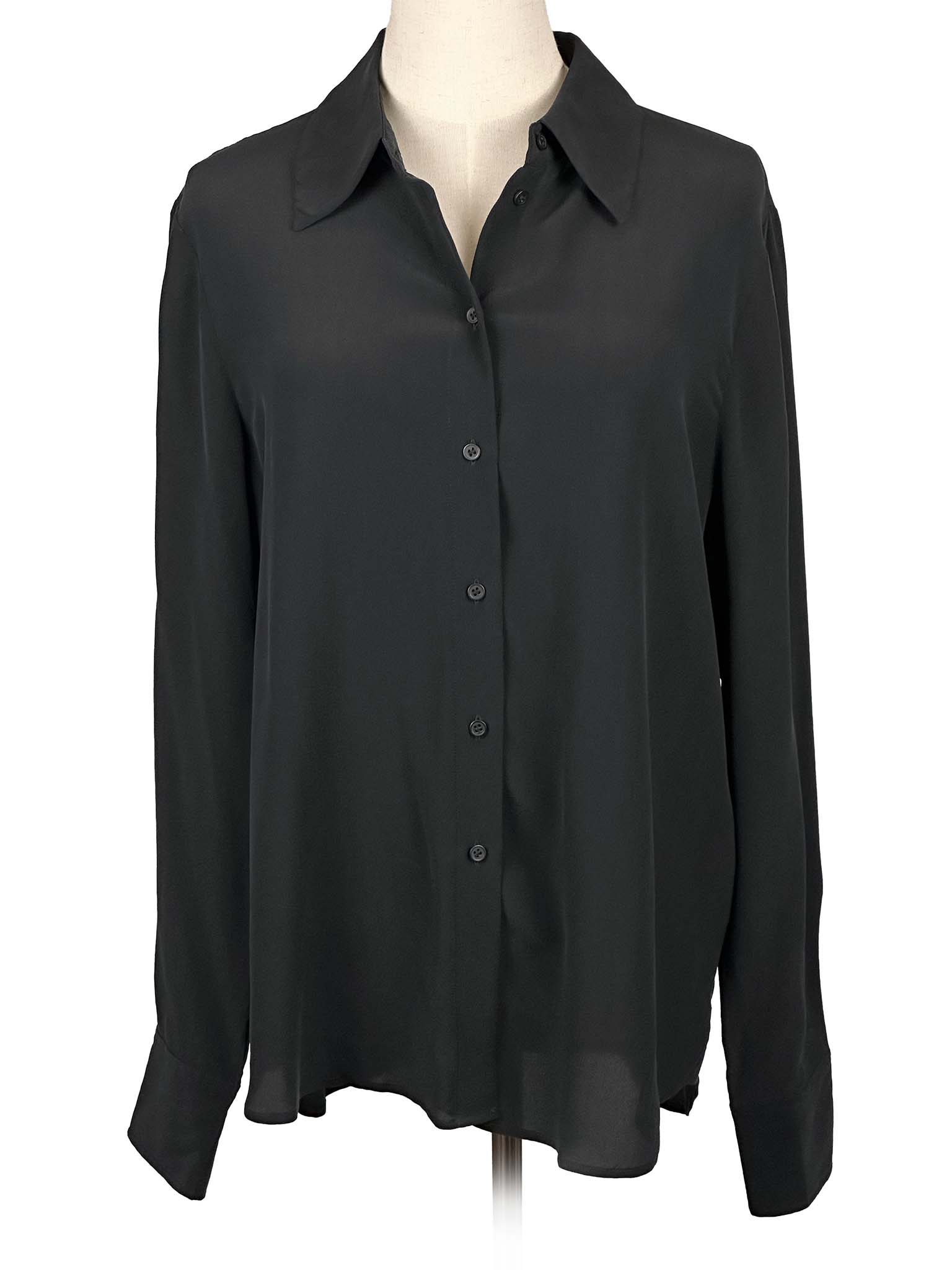 & Other Stories black shirt on a mannequin against a white background