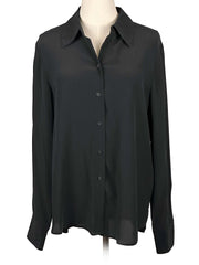 & Other Stories black shirt on a mannequin against a white background