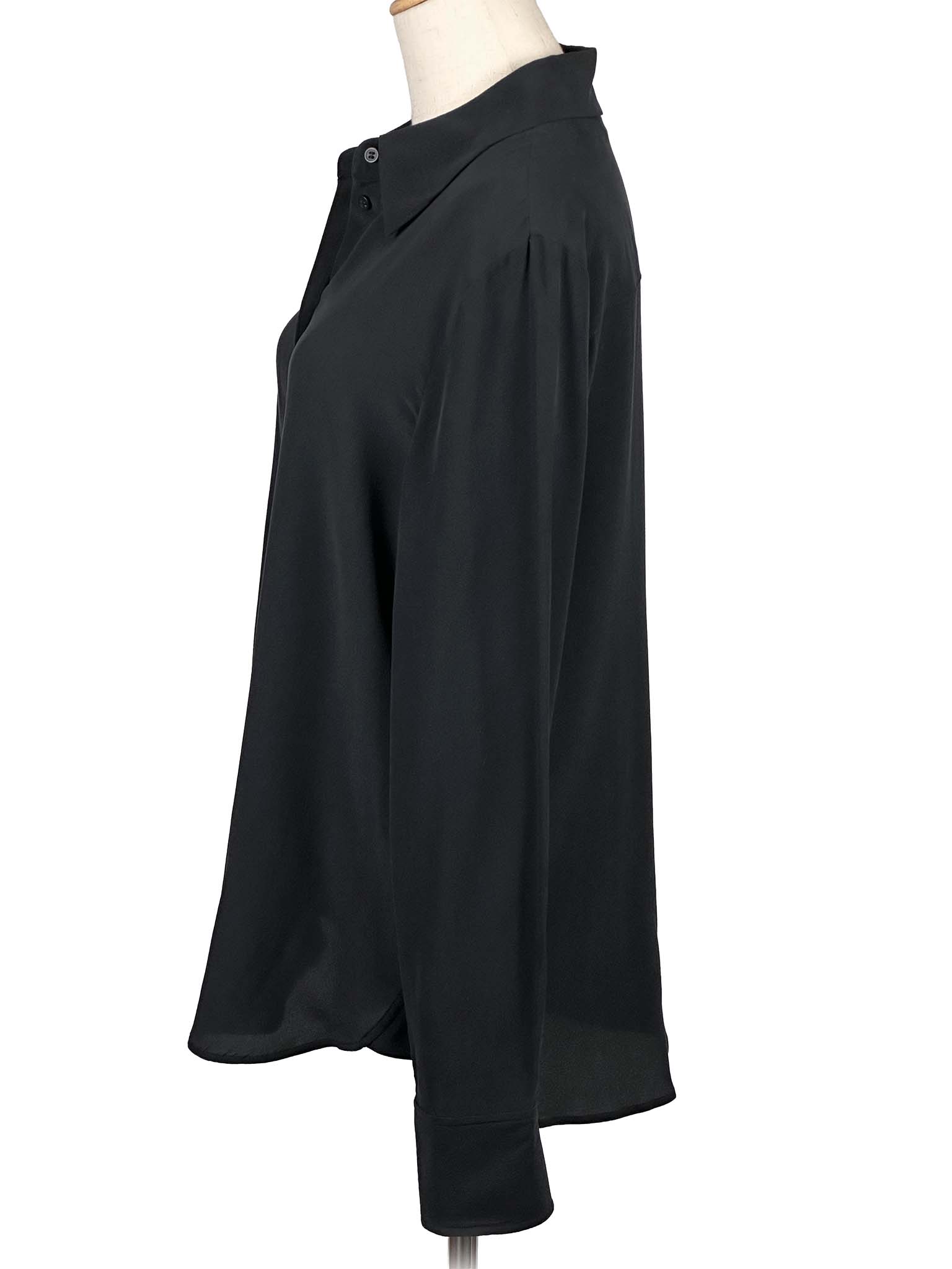 & Other Stories black shirt on a mannequin against a white background