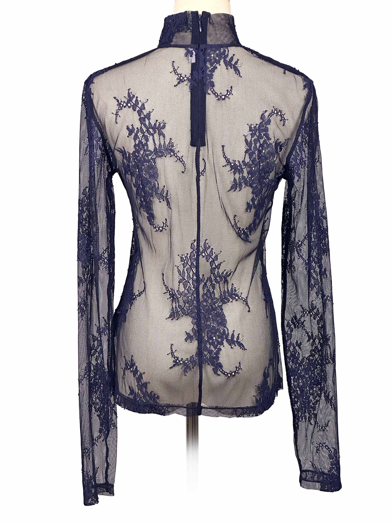 & Other Stories sheer navy lace top on a mannequin against a white background