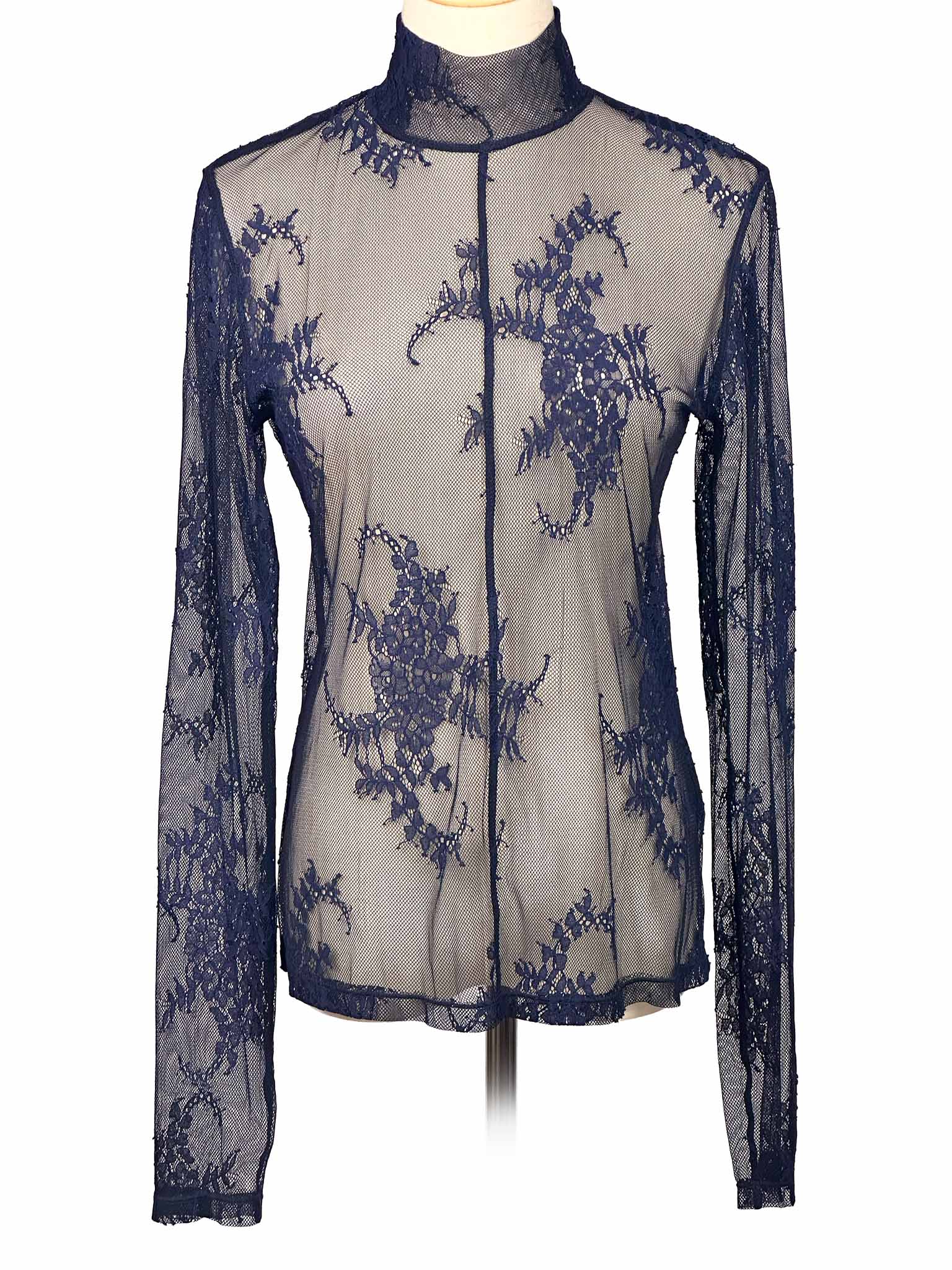 & Other Stories sheer navy lace top on a mannequin against a white background