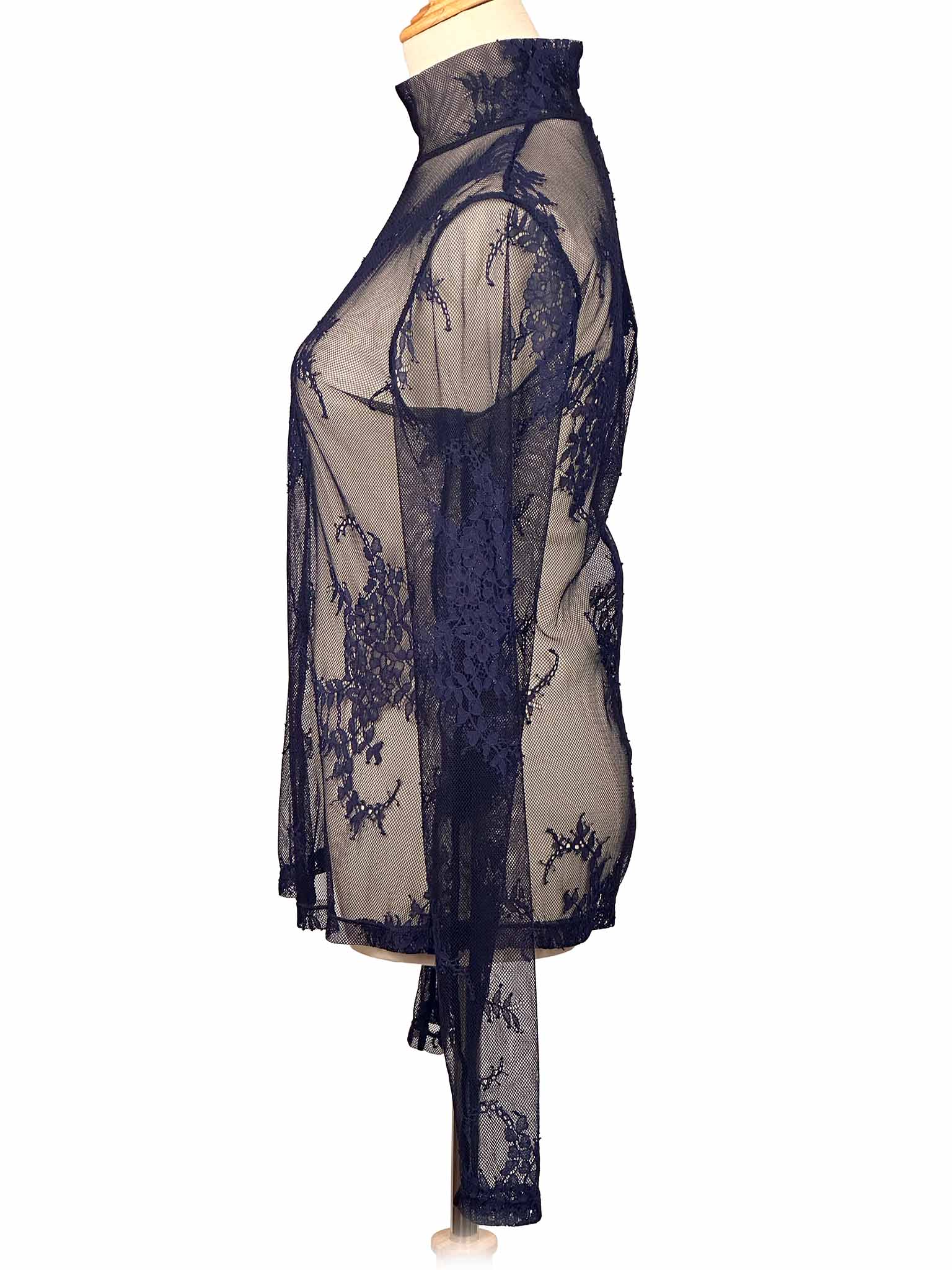 & Other Stories sheer navy lace top on a mannequin against a white background